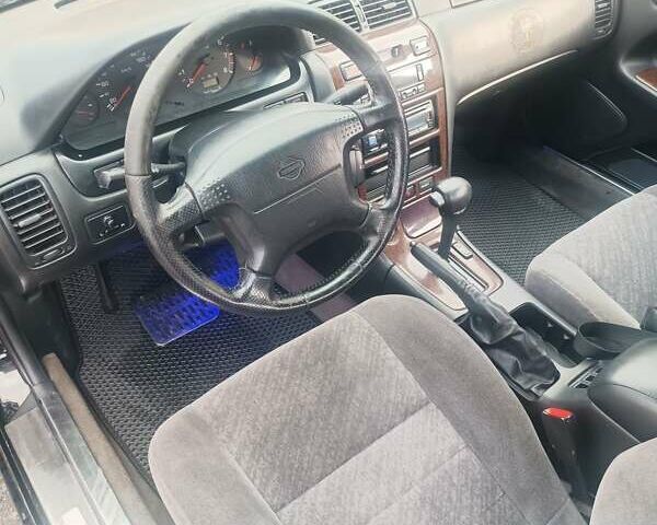 Черный Ниссан Максима, объемом двигателя 2 л и пробегом 291 тыс. км за 2850 $, фото 12 на Automoto.ua