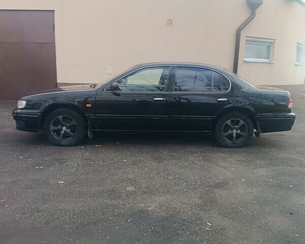 Черный Ниссан Максима, объемом двигателя 2 л и пробегом 291 тыс. км за 2850 $, фото 6 на Automoto.ua