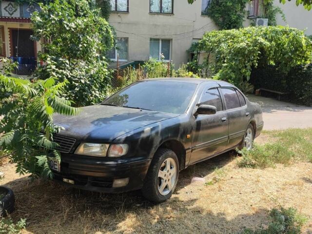 Чорний Ніссан Максіма, об'ємом двигуна 2 л та пробігом 416 тис. км за 1800 $, фото 7 на Automoto.ua