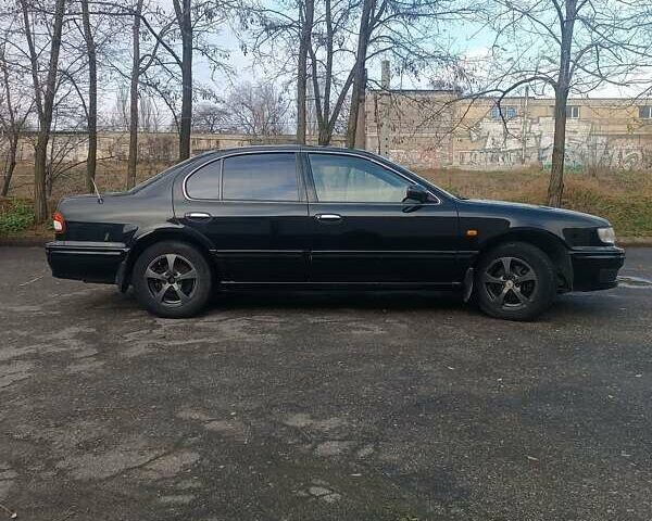 Черный Ниссан Максима, объемом двигателя 2 л и пробегом 291 тыс. км за 2850 $, фото 7 на Automoto.ua
