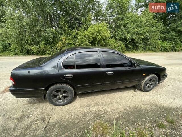 Чорний Ніссан Максіма, об'ємом двигуна 2 л та пробігом 298 тис. км за 3000 $, фото 4 на Automoto.ua