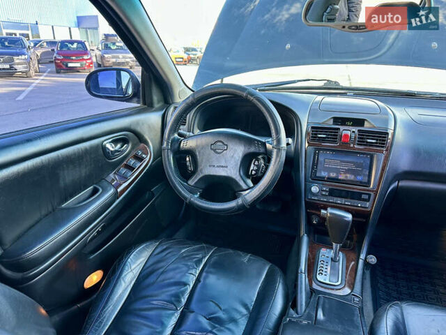 Черный Ниссан Максима, объемом двигателя 2.99 л и пробегом 250 тыс. км за 4200 $, фото 18 на Automoto.ua