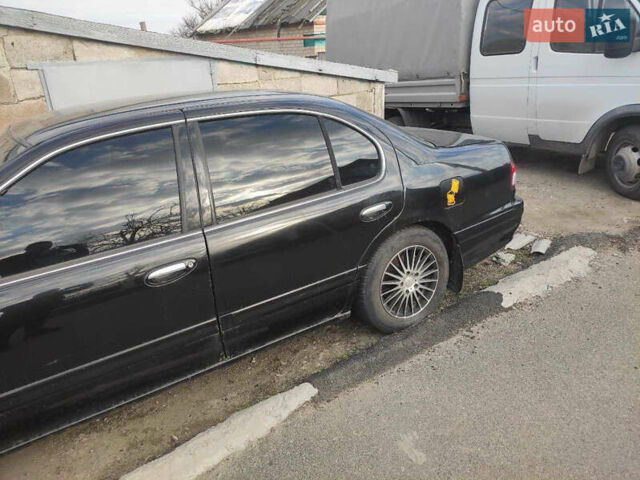 Черный Ниссан Максима, объемом двигателя 2 л и пробегом 333 тыс. км за 1000 $, фото 4 на Automoto.ua