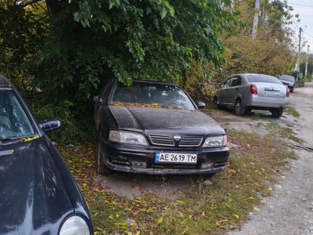 Черный Ниссан Максима, объемом двигателя 2 л и пробегом 300 тыс. км за 1000 $, фото 2 на Automoto.ua