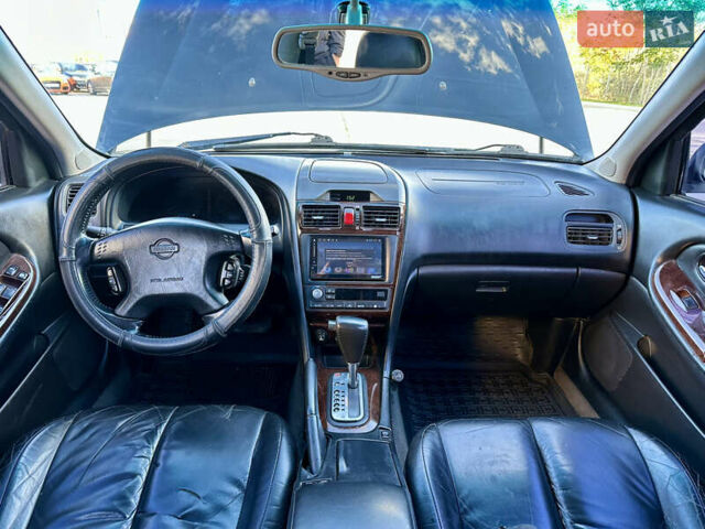 Черный Ниссан Максима, объемом двигателя 2.99 л и пробегом 250 тыс. км за 4200 $, фото 17 на Automoto.ua