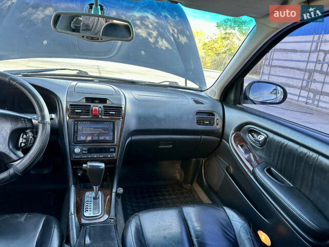 Черный Ниссан Максима, объемом двигателя 2.99 л и пробегом 250 тыс. км за 4200 $, фото 19 на Automoto.ua