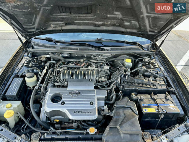 Черный Ниссан Максима, объемом двигателя 2.99 л и пробегом 250 тыс. км за 4200 $, фото 22 на Automoto.ua