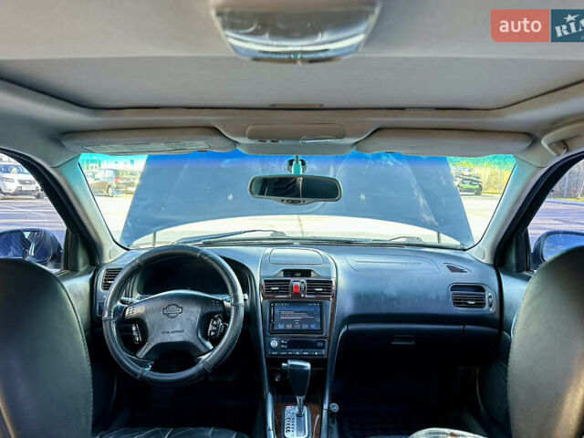 Черный Ниссан Максима, объемом двигателя 2.99 л и пробегом 250 тыс. км за 4200 $, фото 21 на Automoto.ua