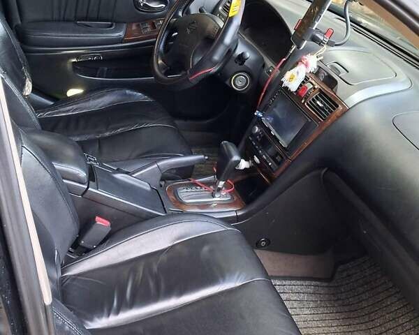 Черный Ниссан Максима, объемом двигателя 2 л и пробегом 310 тыс. км за 3500 $, фото 2 на Automoto.ua