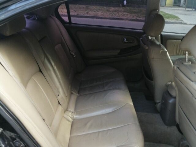 Чорний Ніссан Максіма, об'ємом двигуна 3 л та пробігом 200 тис. км за 2617 $, фото 3 на Automoto.ua