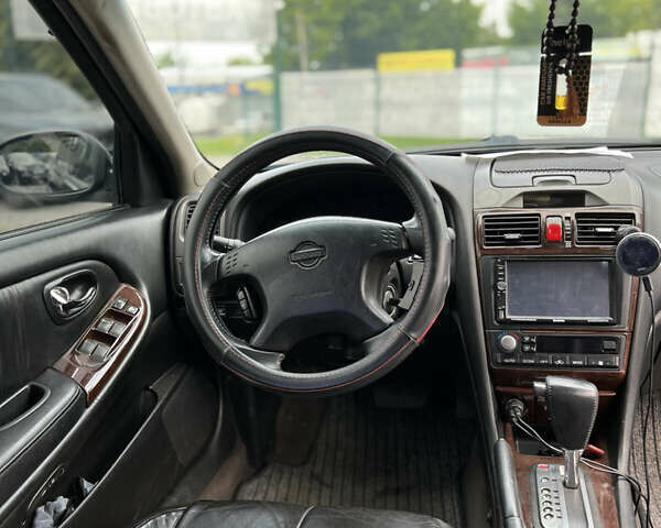 Чорний Ніссан Максіма, об'ємом двигуна 2 л та пробігом 303 тис. км за 4200 $, фото 5 на Automoto.ua
