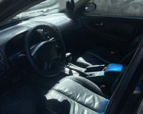 Ніссан Максіма 2001 у Одесі на Automoto.ua Чорний Ніссан Максіма, об'ємом двигуна 2 л та пробігом 378 тис. км за 3500 $, фото 16 на Automoto.ua