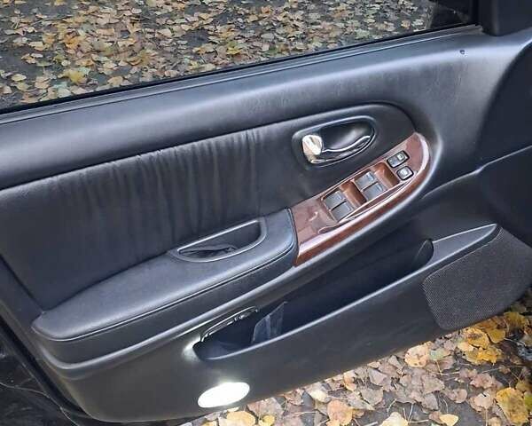 Черный Ниссан Максима, объемом двигателя 2 л и пробегом 310 тыс. км за 3500 $, фото 13 на Automoto.ua
