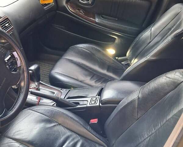 Черный Ниссан Максима, объемом двигателя 2 л и пробегом 310 тыс. км за 3500 $, фото 15 на Automoto.ua