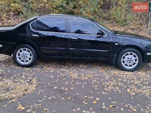 Черный Ниссан Максима, объемом двигателя 2 л и пробегом 310 тыс. км за 3500 $, фото 5 на Automoto.ua