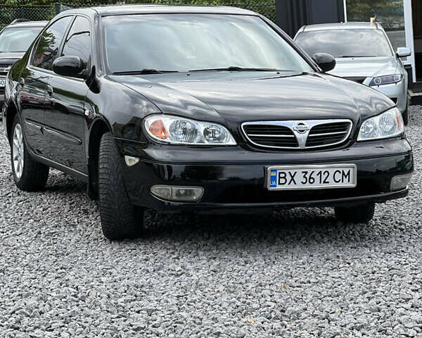 Чорний Ніссан Максіма, об'ємом двигуна 2 л та пробігом 303 тис. км за 4200 $, фото 1 на Automoto.ua