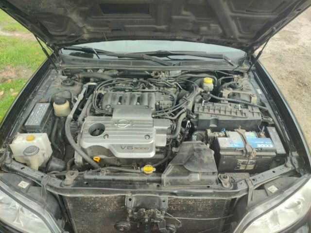 Черный Ниссан Максима, объемом двигателя 3 л и пробегом 300 тыс. км за 3450 $, фото 5 на Automoto.ua