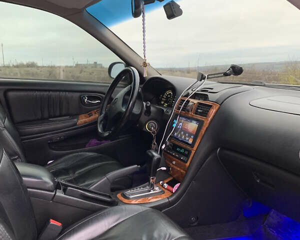 Черный Ниссан Максима, объемом двигателя 2 л и пробегом 258 тыс. км за 4500 $, фото 14 на Automoto.ua