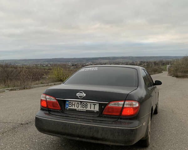 Черный Ниссан Максима, объемом двигателя 2 л и пробегом 258 тыс. км за 4500 $, фото 3 на Automoto.ua