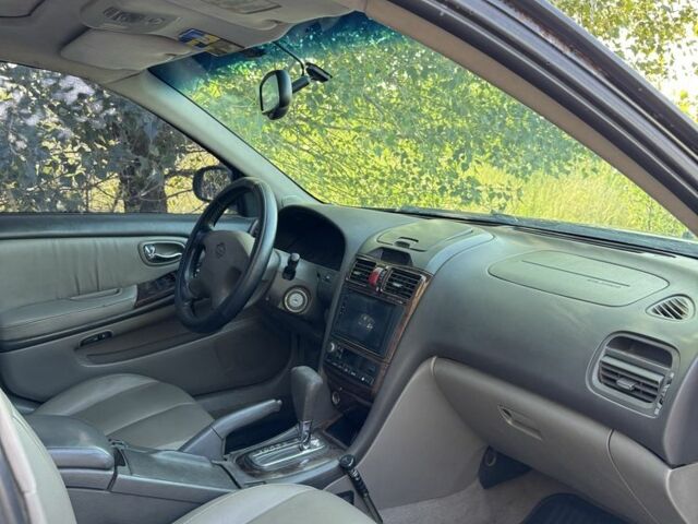 Черный Ниссан Максима, объемом двигателя 2 л и пробегом 330 тыс. км за 3000 $, фото 6 на Automoto.ua