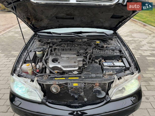 Черный Ниссан Максима, объемом двигателя 3 л и пробегом 399 тыс. км за 3950 $, фото 48 на Automoto.ua