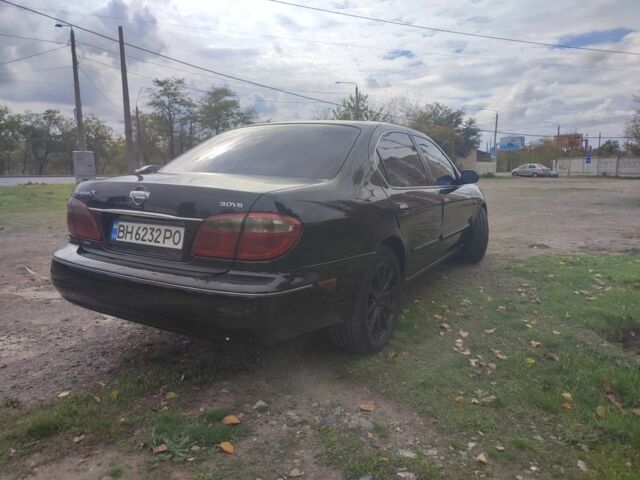 Черный Ниссан Максима, объемом двигателя 3 л и пробегом 300 тыс. км за 3450 $, фото 7 на Automoto.ua