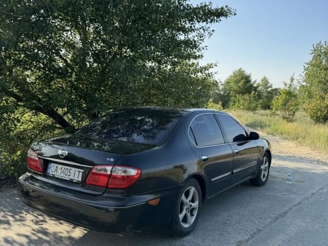 Черный Ниссан Максима, объемом двигателя 2 л и пробегом 330 тыс. км за 3000 $, фото 2 на Automoto.ua