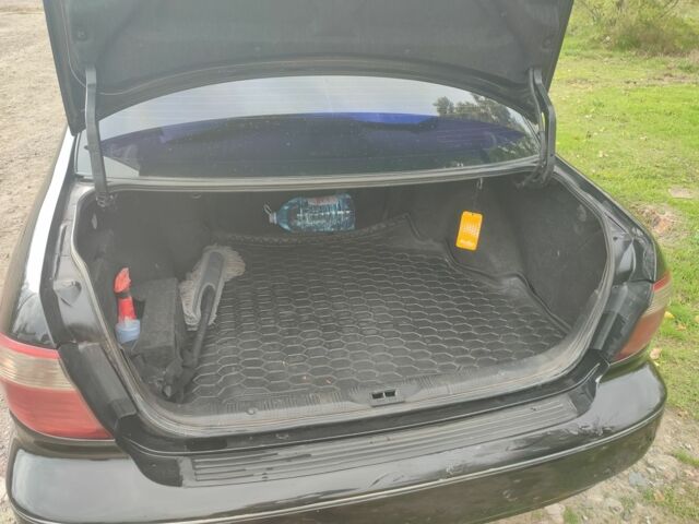 Черный Ниссан Максима, объемом двигателя 3 л и пробегом 300 тыс. км за 3450 $, фото 4 на Automoto.ua