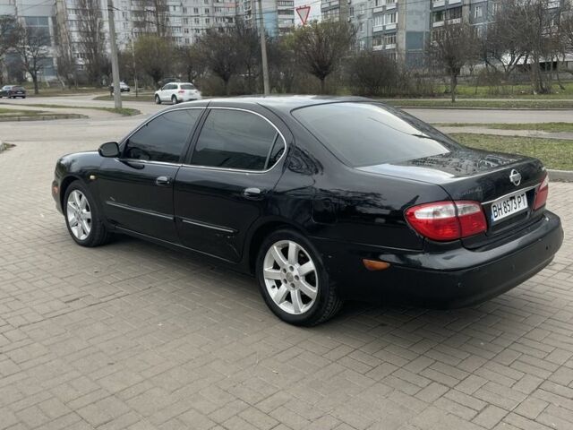 Чорний Ніссан Максіма, об'ємом двигуна 3 л та пробігом 418 тис. км за 2999 $, фото 4 на Automoto.ua
