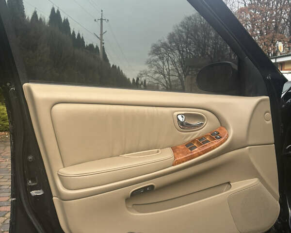 Черный Ниссан Максима, объемом двигателя 3 л и пробегом 323 тыс. км за 5799 $, фото 21 на Automoto.ua