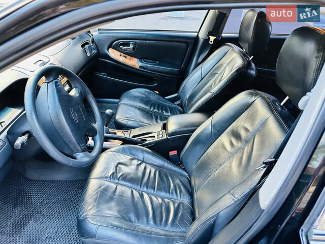 Черный Ниссан Максима, объемом двигателя 2 л и пробегом 197 тыс. км за 5400 $, фото 17 на Automoto.ua