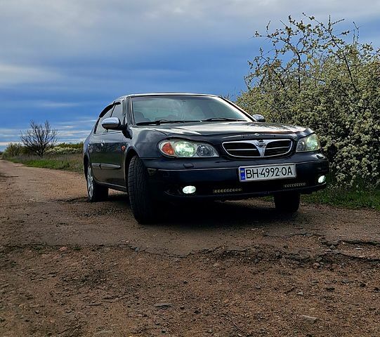 Черный Ниссан Максима, объемом двигателя 2 л и пробегом 390 тыс. км за 3800 $, фото 6 на Automoto.ua