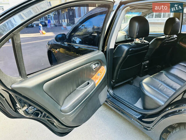 Черный Ниссан Максима, объемом двигателя 2 л и пробегом 197 тыс. км за 5400 $, фото 22 на Automoto.ua