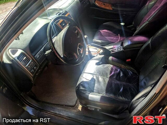 Черный Ниссан Максима, объемом двигателя 3 л и пробегом 464 тыс. км за 3800 $, фото 1 на Automoto.ua