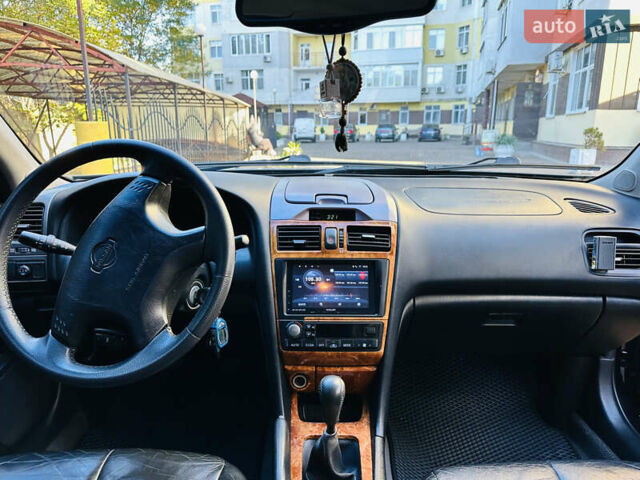 Черный Ниссан Максима, объемом двигателя 2 л и пробегом 197 тыс. км за 5400 $, фото 24 на Automoto.ua