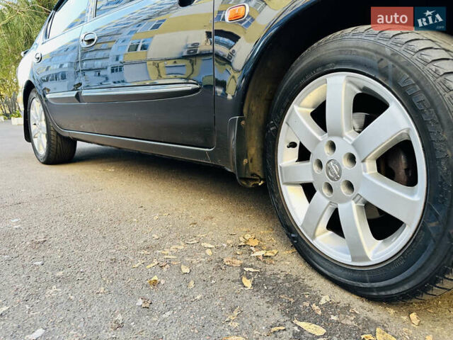 Черный Ниссан Максима, объемом двигателя 2 л и пробегом 197 тыс. км за 5400 $, фото 30 на Automoto.ua