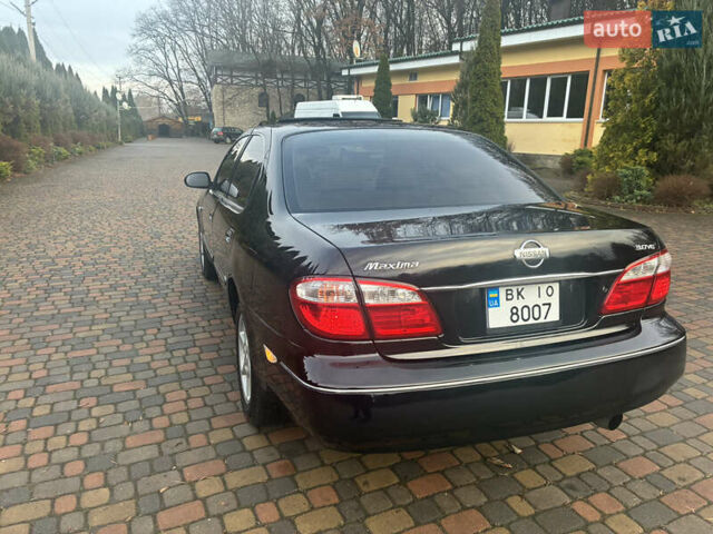 Черный Ниссан Максима, объемом двигателя 3 л и пробегом 323 тыс. км за 5799 $, фото 4 на Automoto.ua