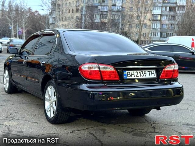 Черный Ниссан Максима, объемом двигателя 3 л и пробегом 220 тыс. км за 3300 $, фото 3 на Automoto.ua