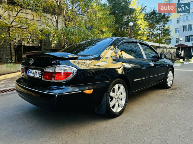 Черный Ниссан Максима, объемом двигателя 2 л и пробегом 197 тыс. км за 5400 $, фото 15 на Automoto.ua