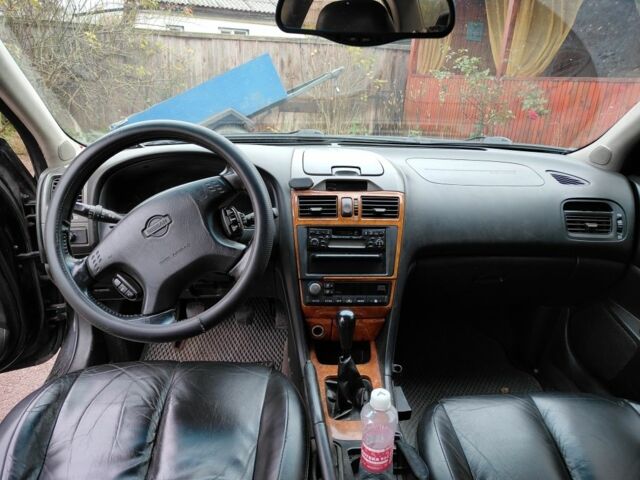 Черный Ниссан Максима, объемом двигателя 3 л и пробегом 320 тыс. км за 3500 $, фото 6 на Automoto.ua