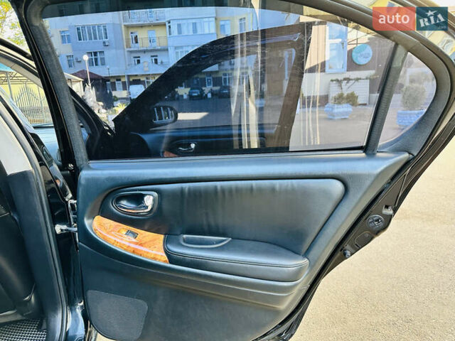 Черный Ниссан Максима, объемом двигателя 2 л и пробегом 197 тыс. км за 5400 $, фото 44 на Automoto.ua