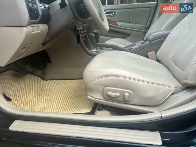 Черный Ниссан Максима, объемом двигателя 3 л и пробегом 323 тыс. км за 5799 $, фото 27 на Automoto.ua