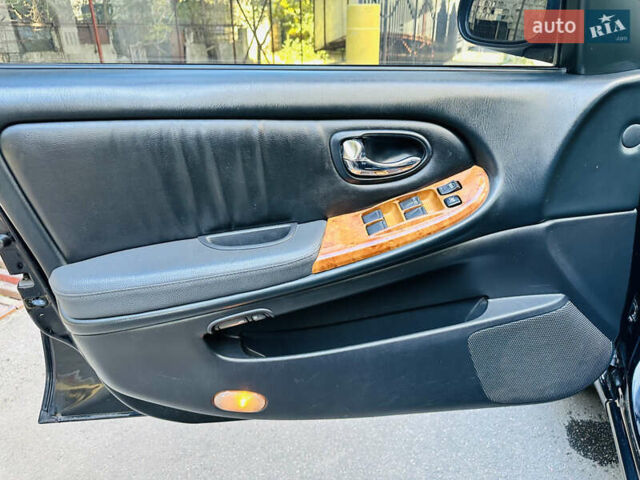 Черный Ниссан Максима, объемом двигателя 2 л и пробегом 197 тыс. км за 5400 $, фото 41 на Automoto.ua