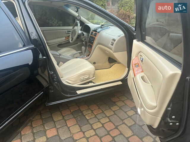 Черный Ниссан Максима, объемом двигателя 3 л и пробегом 323 тыс. км за 5799 $, фото 34 на Automoto.ua