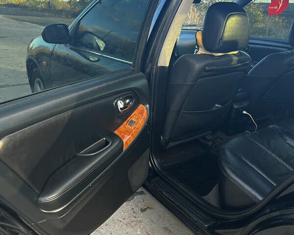 Черный Ниссан Максима, объемом двигателя 2 л и пробегом 300 тыс. км за 3300 $, фото 19 на Automoto.ua