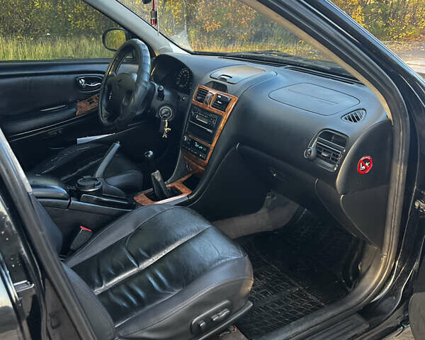 Черный Ниссан Максима, объемом двигателя 2 л и пробегом 300 тыс. км за 3300 $, фото 15 на Automoto.ua