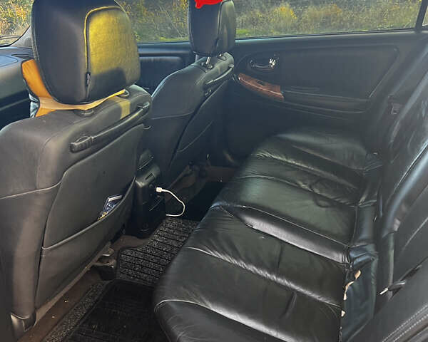 Черный Ниссан Максима, объемом двигателя 2 л и пробегом 300 тыс. км за 3300 $, фото 18 на Automoto.ua