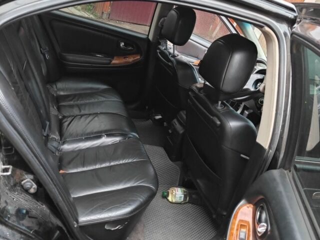 Черный Ниссан Максима, объемом двигателя 3 л и пробегом 320 тыс. км за 3500 $, фото 7 на Automoto.ua