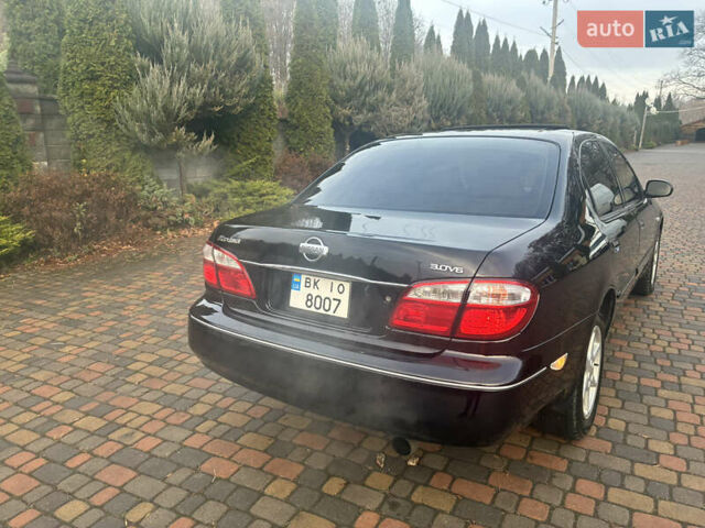 Черный Ниссан Максима, объемом двигателя 3 л и пробегом 323 тыс. км за 5799 $, фото 3 на Automoto.ua