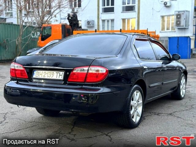 Черный Ниссан Максима, объемом двигателя 3 л и пробегом 220 тыс. км за 3300 $, фото 2 на Automoto.ua